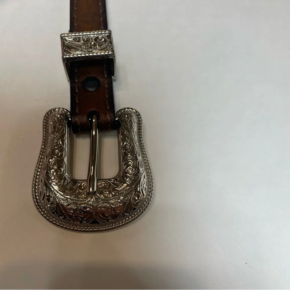 Belt women’s western with silver accents. Floral etched design. 43” long. Used. - Picture 2 of 8
